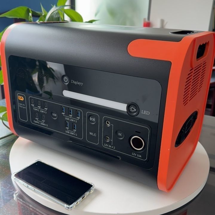 800W Solar Charging Portable Energy Storage Power Station in Black with Orange Color
